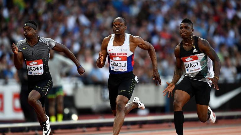 LONDON, ENGLAND - JULY 22:  Aaron Brown of Canada (L), James Dasaolu of Great Britain (C) and Marvin Bracey of The USA in action during their 100m heat on 