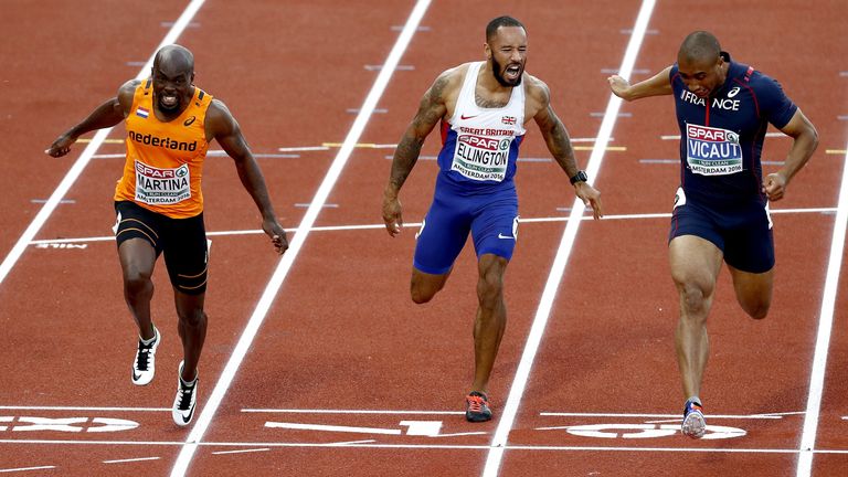 (L to R) Netherlands' Churandy Martina, Britain's James Ellington and France's Jimmy Vicaut cross the finish line of the men's 100 m final race during the 