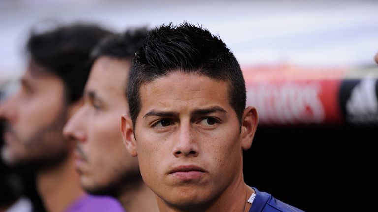 James Rodriguez looks on from the bench before Real Madrid's La Liga match against Celta Vigo
