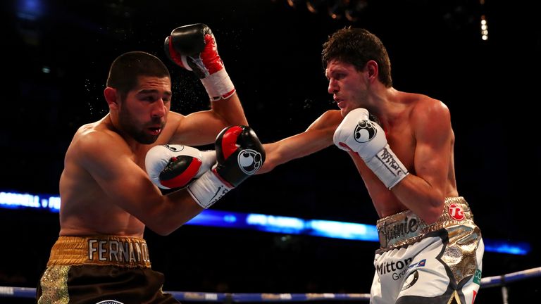 LONDON, ENGLAND - APRIL 09:  Jamie McDonnell of England lands a punch on Fernando Vargas of Mexico during the WBA World Bantamweight title fight at The O2 