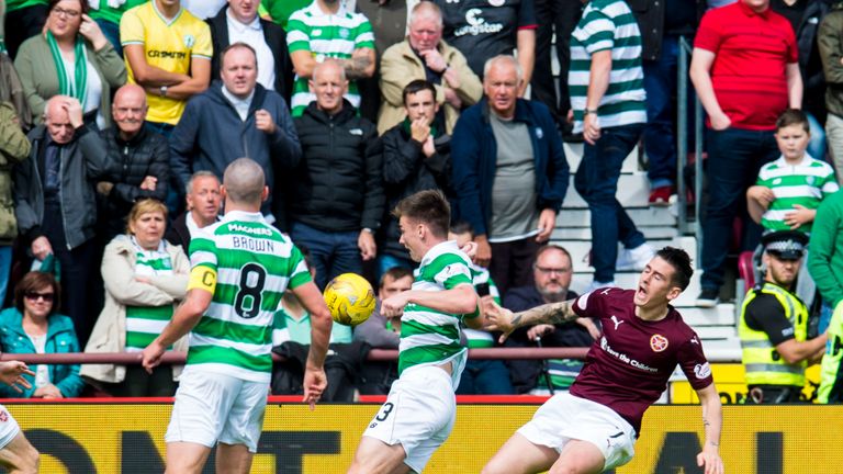 Jamie Walker of Hearts (right) is awarded a penalty against Celtic at Tynecastle