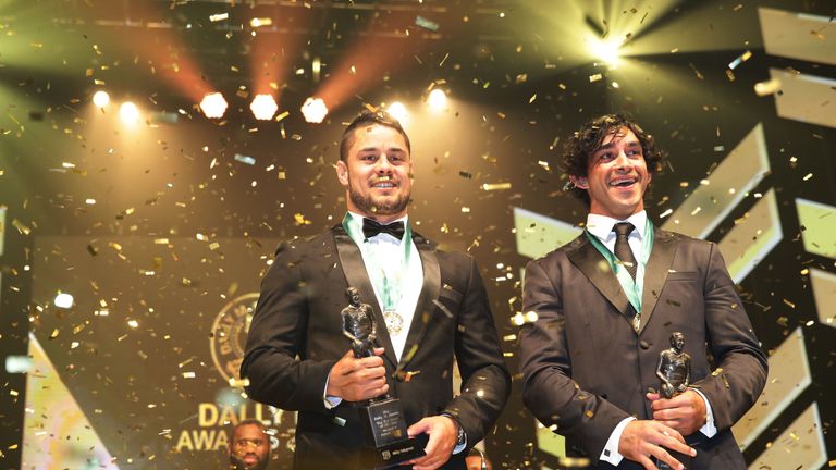 Jarryd Hayne (L) and Johnathan Thurston (R) pose after being presented as joint winners of the Dally M Medal in 2014