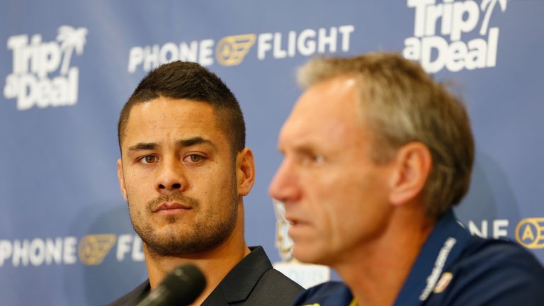 Jarryd Hayne with Titans coach Neil Henry during a press conference at Gold Coast Airport on August 3, 2016