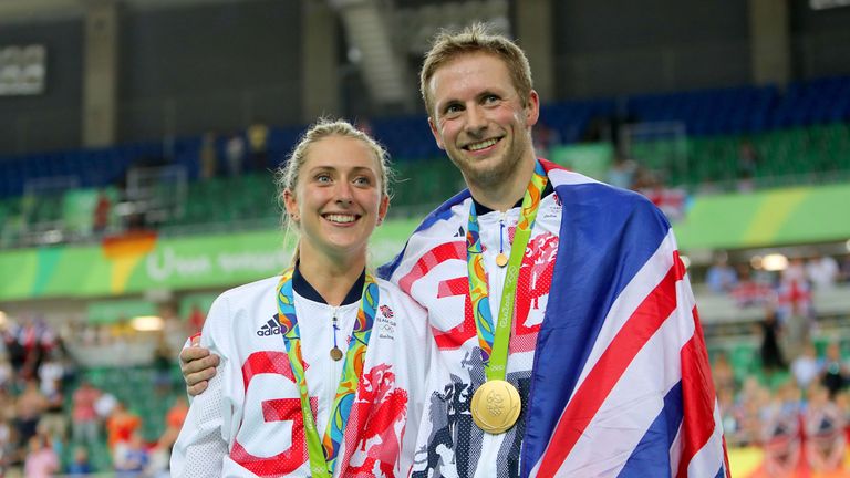 Great Britain's Jason Kenny after winning the gold medal in the Keirin poses with fiancee Laura Trott who won gold in the omnium