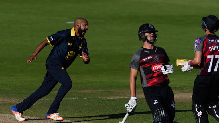 Warwickshire bowler Jeetan Patel celebrates after dismissing Somerset batsman Davies (r) during the Royal London One-Day  Cup