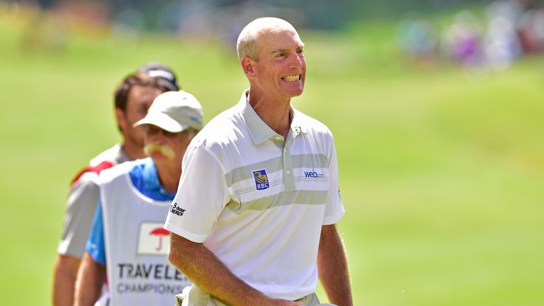 Jim Furyk of the United States celebrates after shooting a record setting 58 during the final round of the Travelers Championship