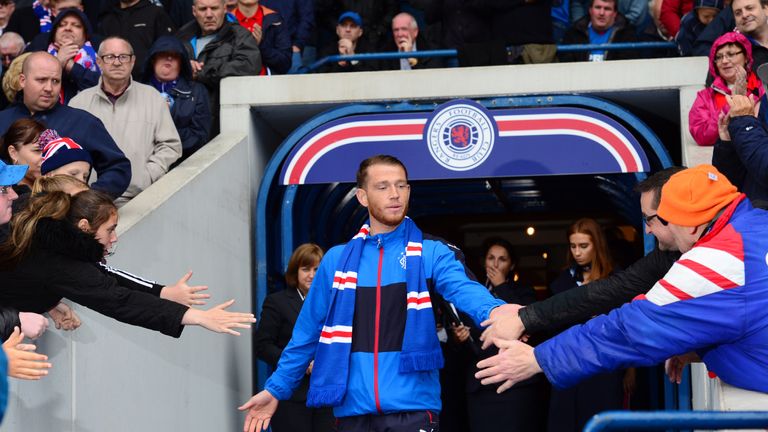 Joe Garner signed a three-year deal with Rangers after remembering Lorenzo Amoruso's tales about the club