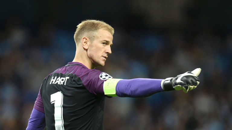 Joe Hart gestures towards the crowd as he comes out for the second half
