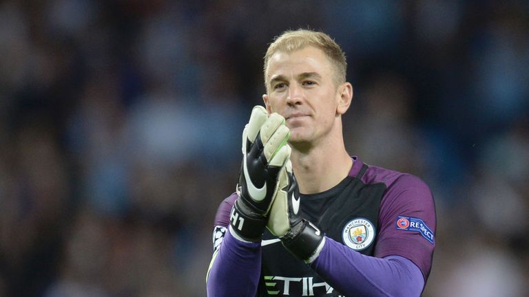 Manchester City's English goalkeeper Joe Hart gestures to the crowd at the end of the UEFA Champions league second leg play-off football match between Manc