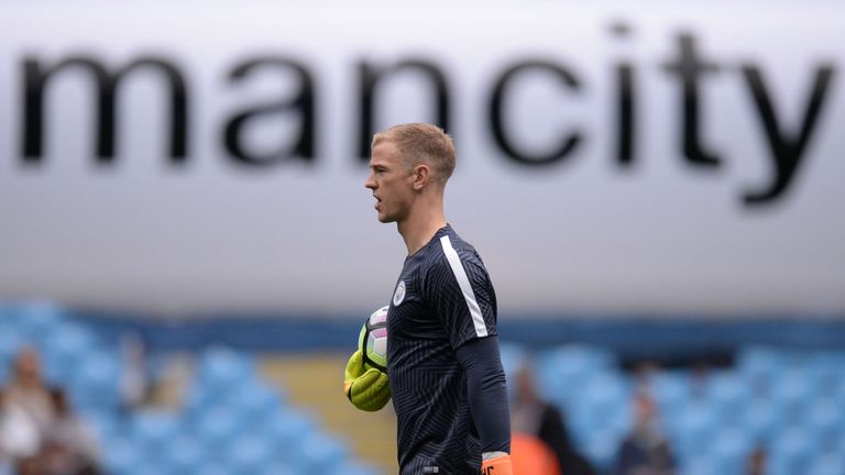 Manchester City's English goalkeeper Joe Hart warms up ahead of the English Premier League football match between Manchester City and Sunderland at the Eti