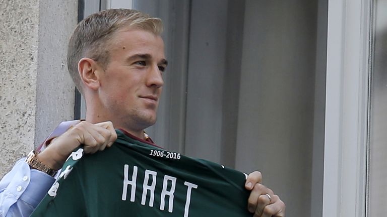 British goalkeeper Joe Hart poses upon his arrival for a medical check before joining the Torino 