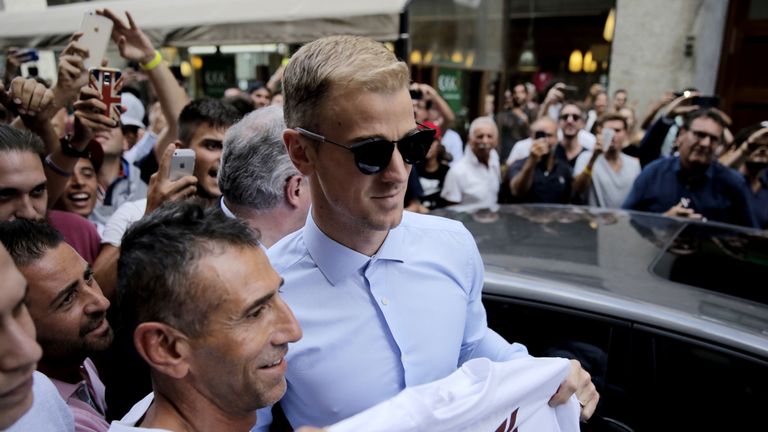 Joe Hart poses with a supporter upon his arrival for a medical before joining Torino 