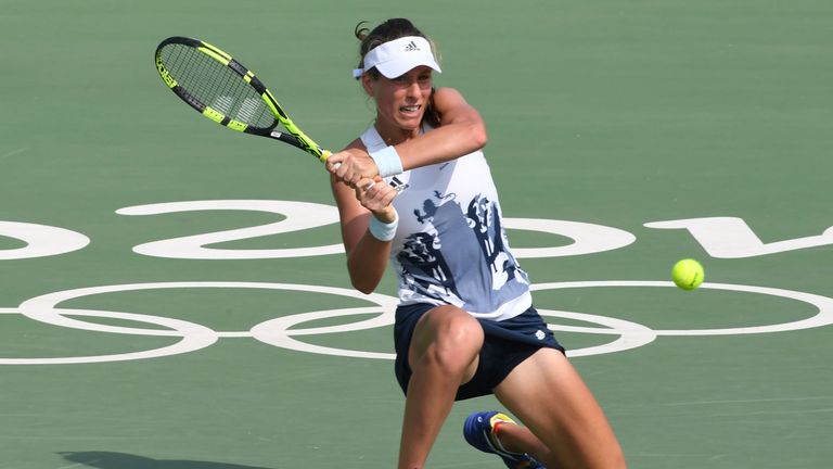 Britain's Johanna Konta returns the ball to France's Caroline Garcia during their women's second round singles tennis match at the Olympic Tennis Centre of