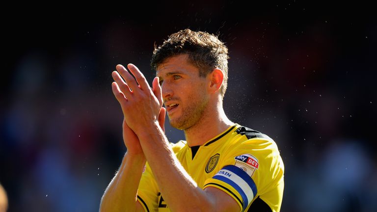 NOTTINGHAM, ENGLAND - AUGUST 06:  John Mousinho of Burton Albion applauds the fans at the end of the Sky Bet Championship match between Nottingham Forest a