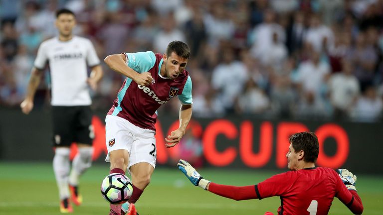 Jonathan Calleri has an attempt on goal saved by Silviu Lung 