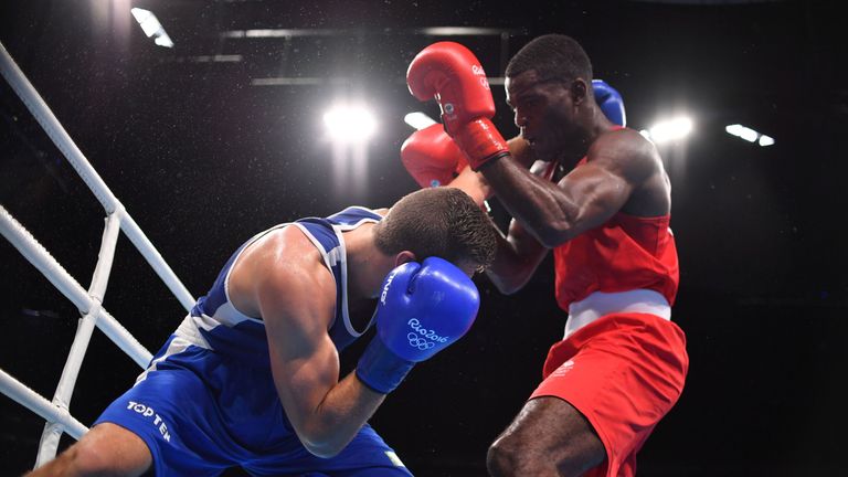 Great Britain's Joshua Buatsi (right) fights Algeria's Abdelhafid Benchabla at the Rio 2016 Olympics