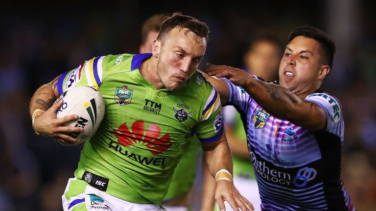 Josh Hodgson of the Raiders runs the ball  during the round 22 NRL match between the Cronulla Sharks and the Canberra Raiders