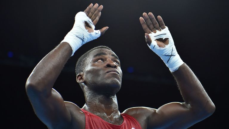 Great Britain's Joshua Buatsi celebrates winning against Algeria's Abdelhafid Benchabla 