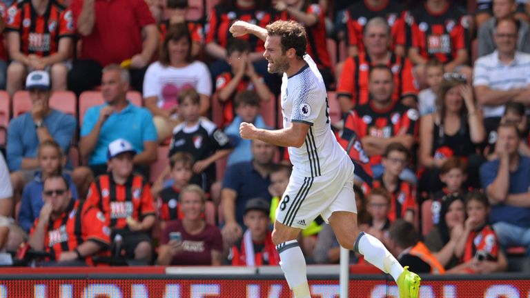 Juan Mata celerbates scoring the opening goal for Manchester United