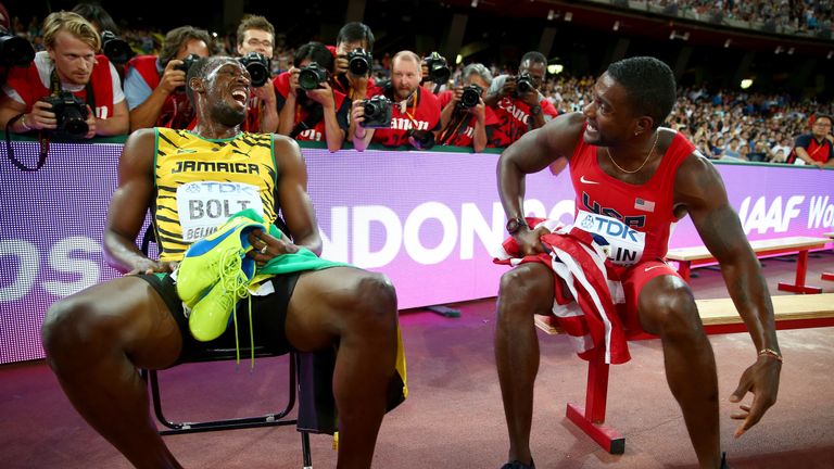 BEIJING, CHINA - AUGUST 27:  Gold medalist Usain Bolt of Jamaica talks with silver medalist Justin Gatlin of the United States after the Men's 200 metres f