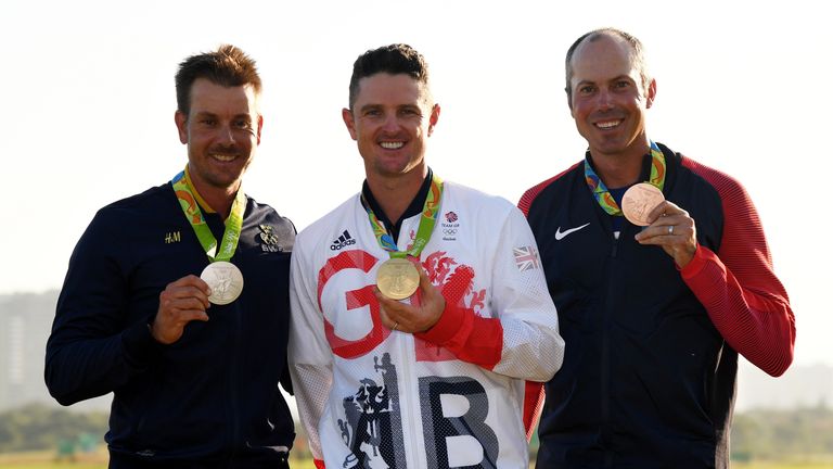 RIO DE JANEIRO, BRAZIL - AUGUST 14:  Justin Rose (C) of Great Britain celebrates with the gold medal, Henrik Stenson (L) of Sweden, silver medal, and Matt 