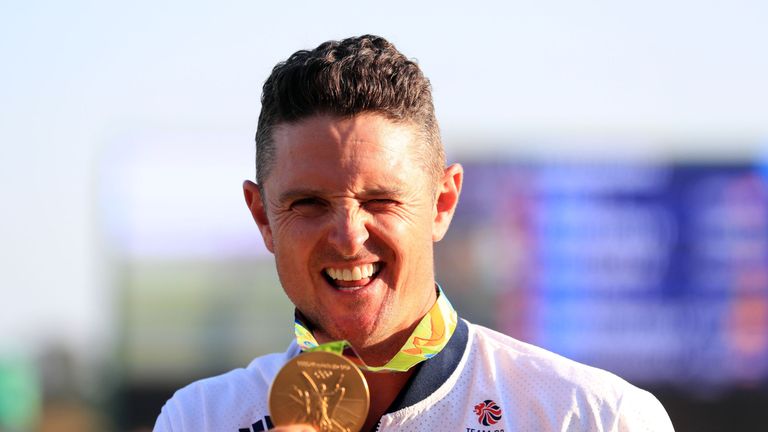 Great Britain's Justin Rose celebrates with his gold medal