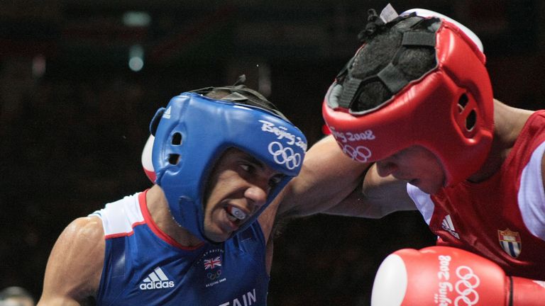 Cuba's Andris Laffita Hernandez (R) fights against Great Britain's Khalid Yafai during their Beijing 2008 Olympic Games