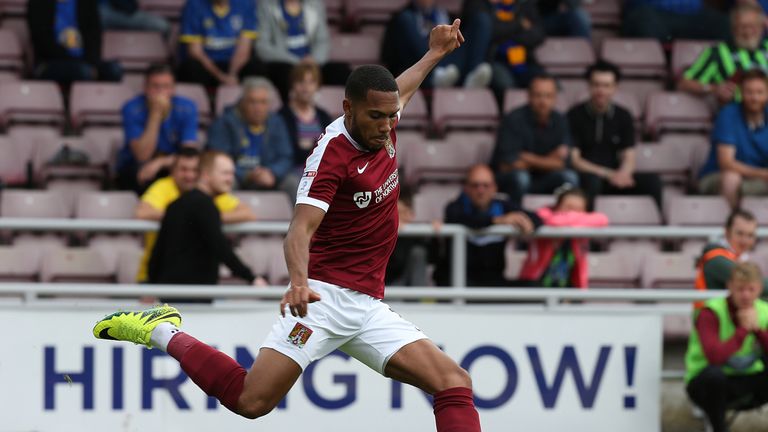 Kenji Gorre of Northampton Town in action 