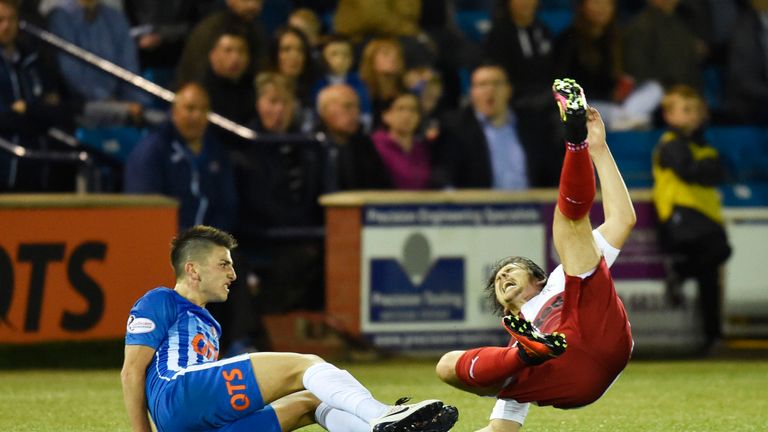 Greg Taylor upends Joey Barton and is red carded at Rugby Park