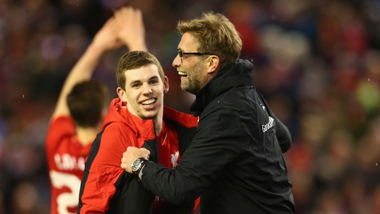 LIVERPOOL, ENGLAND - JANUARY 26:  Jurgen Klopp manager of Liverpool and Jon Flanagan of Liverpool celebrate victory in the penalty shoot out after the Capi