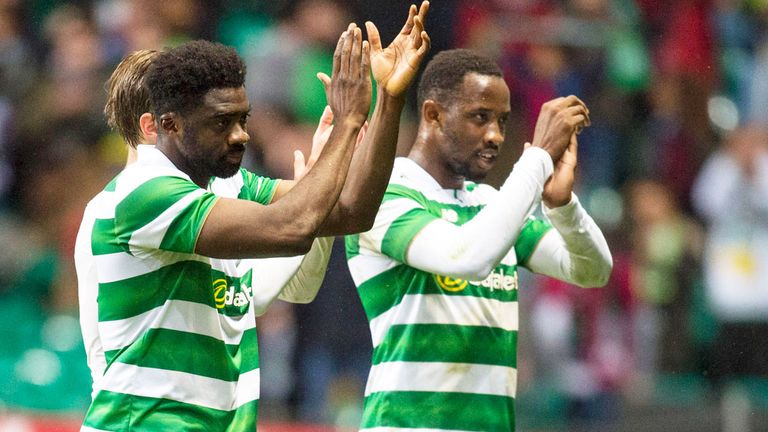 Kolo Toure (L) and Moussa Dembele celebrate Celtic's win over Astana