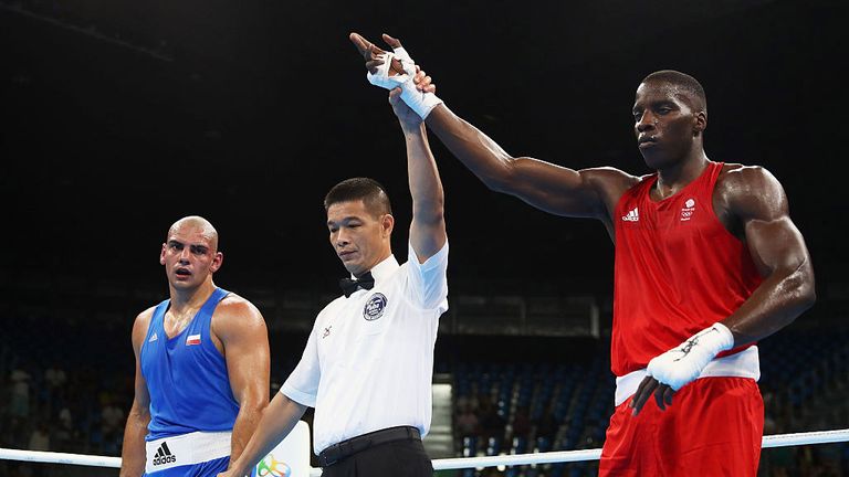 Lawrence Okolie (red) of Great Britain celebrates victory over Igor Pawel Jakubowski of Poland 