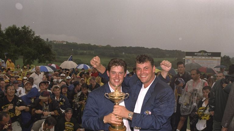 28 Sep 1997:  European team members Lee Westwood and Darren Clarke celebrate with the trophy after victory over the USA in the Johnnie Walker Ryder Cup at 
