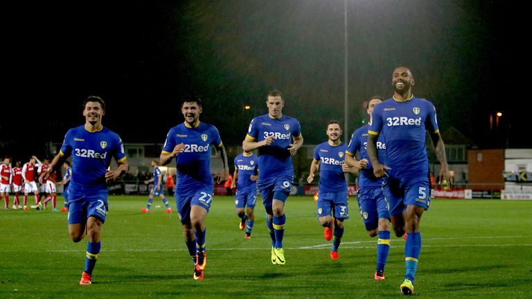 Leeds United players run to congratulate their goalkeeper Robert Green after the penalty win during the EFL Cup, First Round match at Highbury Stadium, Fle