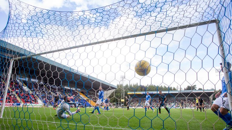 Celtic's Leigh Griffiths scores his sides opening goal against St Johnstone