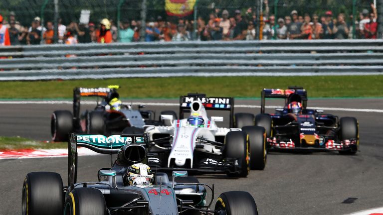 Lewis Hamilton cuts through the Belgian Grand Prix field in his Mercedes