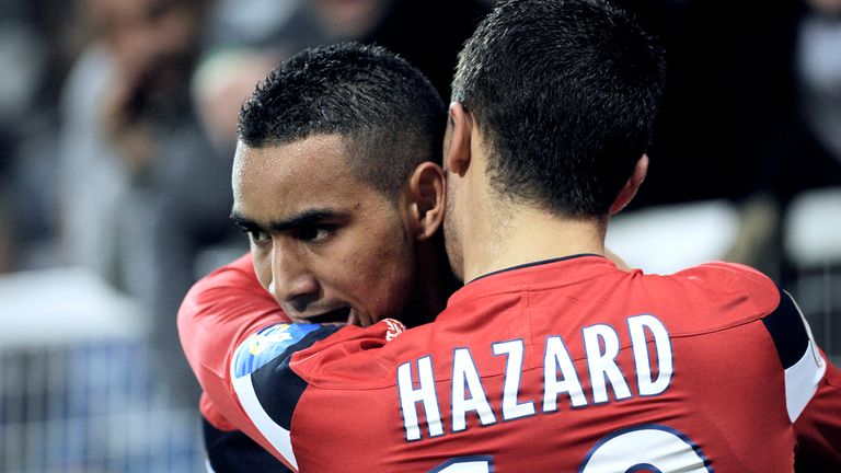 Lille's Dimitri Payet is congratulated by his teammate  Eden Hazard after scoring a goal for Lille against Auxerre in October 2011