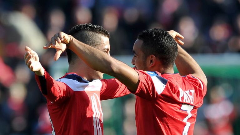 Lille's Dimitri Payet is congratuled by Eden Hazard after scoring a goal for Lille against Toulouse in April 2012