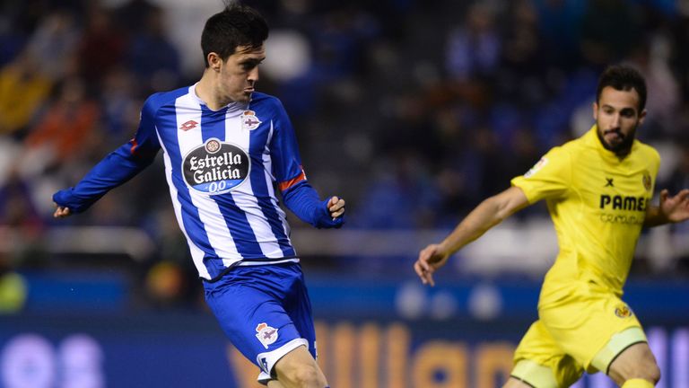 Deportivo La Coruna's midfielder Luis Alberto touches the ball to score during the Spanish league football match RC Deportivo de la Coruna vs Villarreal CF