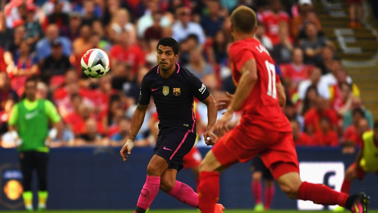 Luis Suarez of Barcelona in action against former club Liverpool during the International Champions Cup match at Wembley