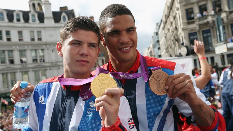 British Olympic boxers Anthony Ogogo (R) and Luke Campbell during the London 2012 Victory Parade 