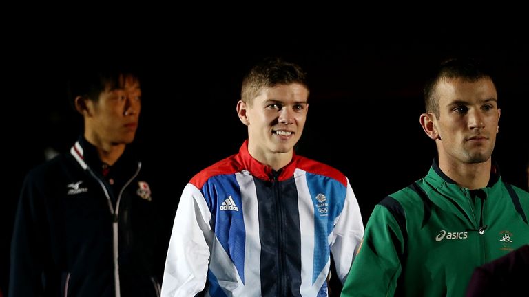 ilver medalist John Joe Nevin (R) of Ireland, gold medalist Luke Campbell (C) of Great Britain and bronze medalist Satoshi Shimizu