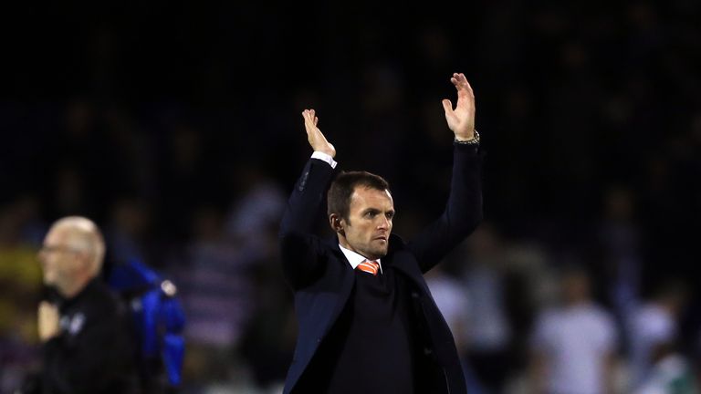 Luton Town manager Nathan Jones applauds the fans after the EFL Cup win over Aston Villa