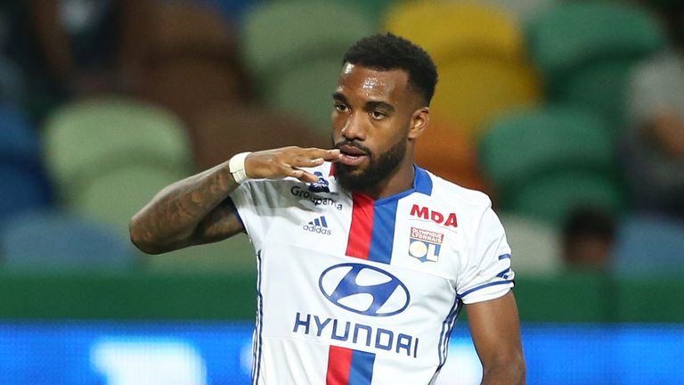 Lyon forward Alexandre Lacazette celebrates after scoring a goal during the Pre Season Friendly match between Sporting CP and Lyon