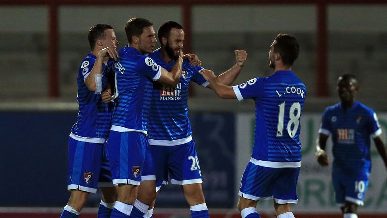 Bournemouth's Marc Wilson (third right) celebrates with team-mate Lewis Cook (right) 