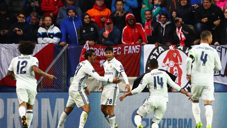 Marco Asensio celebrates scoring Real Madrid's opener against Sevilla