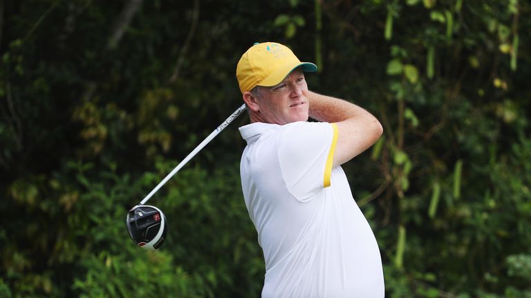 Marcus Fraser of Australia hits his tee shot on the 11th hole during the second round of the golf on Day 7 of the Rio Olympics