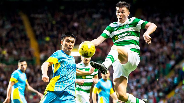 Astana's Marin Anicic brings down Kieran Tierney for the first Celtic penalty 