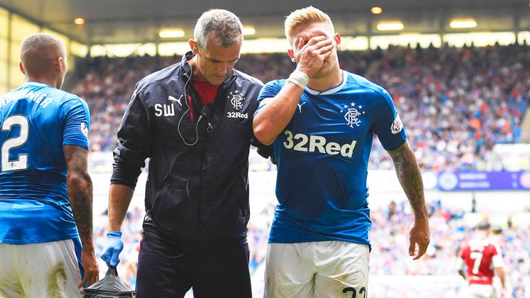 Martyn Waghorn (right) leaves the pitch after pulling his hamstring against Hamilton