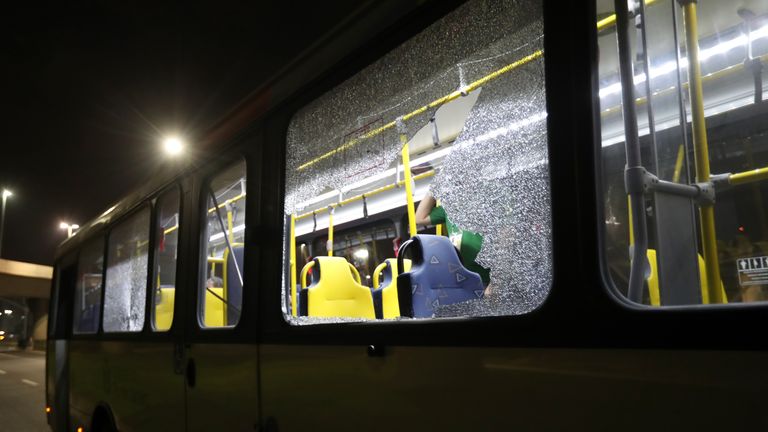 Damage to a media bus in the Deodoro area of Rio de Janeiro 
